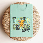 Daycare through Fifth Grade Rocks Teal Bolt-ADULT